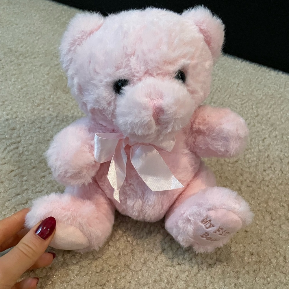 Pink "My First Teddy Bear".  Brand new, tags removed.